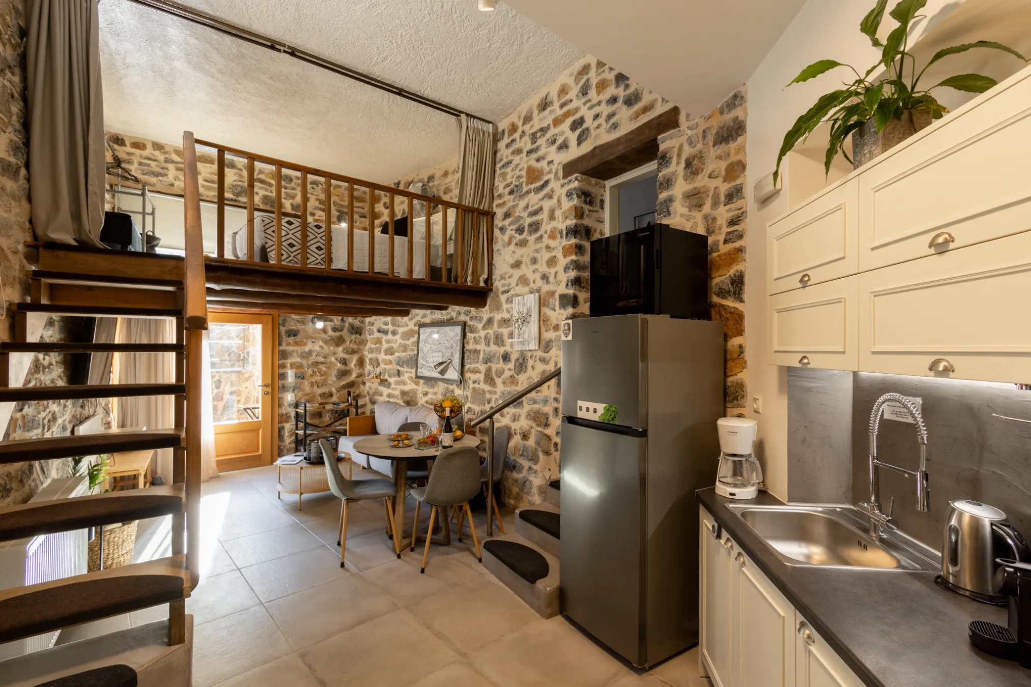 Interior kitchen and dining area in Palio Damnoni SEASIDE RESIDENCE