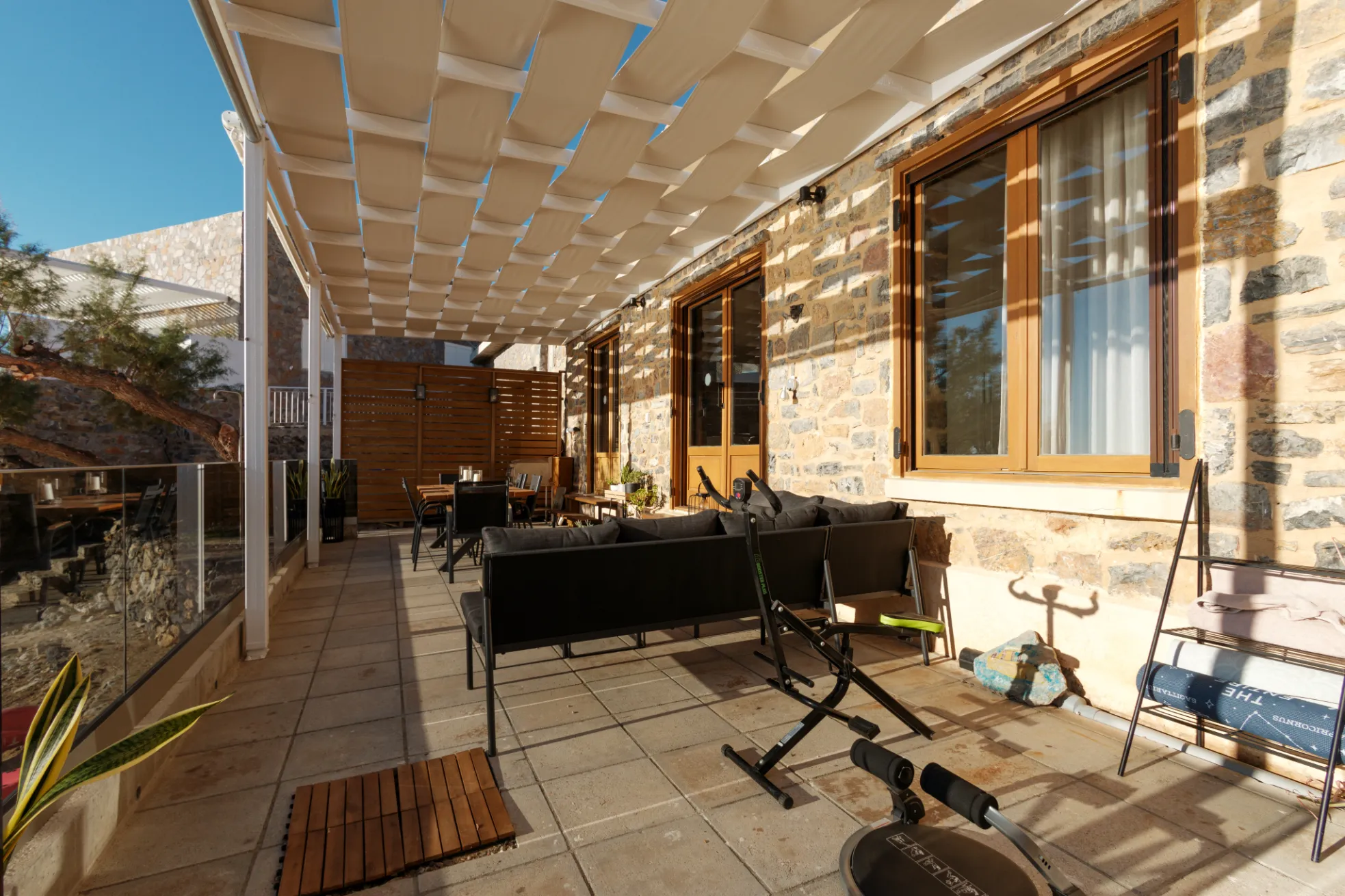 Outdoor lounging area of Palio Damnoni villa